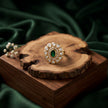 Bhavmayi Oval Zircon Vintage Shield Polki-Diamond Gold Finish Ring with Pave and Trillion Motif Halo
