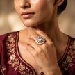 Bhavmayi Oval Zircon Vintage Shield Polki-Diamond Gold Finish Ring with Pave and Trillion Motif Halo