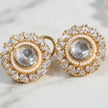 Bhavmayi Gold Plated Round Polki Kundan Stud Earrings with Pearl Halo and Pear Cut Emerald Green Gemstone Wreath