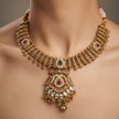 Bhavmayi Antique Gold and Polki Temple Jewellery Pendant Necklace and Earrings Set with Ruby & Emerald Accents