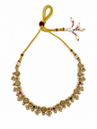 Traditional gold-tone floral necklace set with matching dangling earrings, featuring magenta and green accents, ivory-white bead-like details and intricate ornamental motifs.