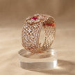 Bhavmayi Luxurious Rose Gold Oval Solitaire Cubic Zirconia Accent Statement Cuff Bracelet with Floral Lattice Pave