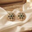 Bhavmayi Gold Plated Emerald Green Floral Cluster Medallion Stud Earrings with Micro-Pave Halos.