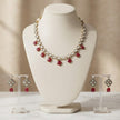 Bhavmayi Antique Gold Polki Kundan Necklace Set with Crimson Ruby Red Gemstone Drops and Matching Earrings