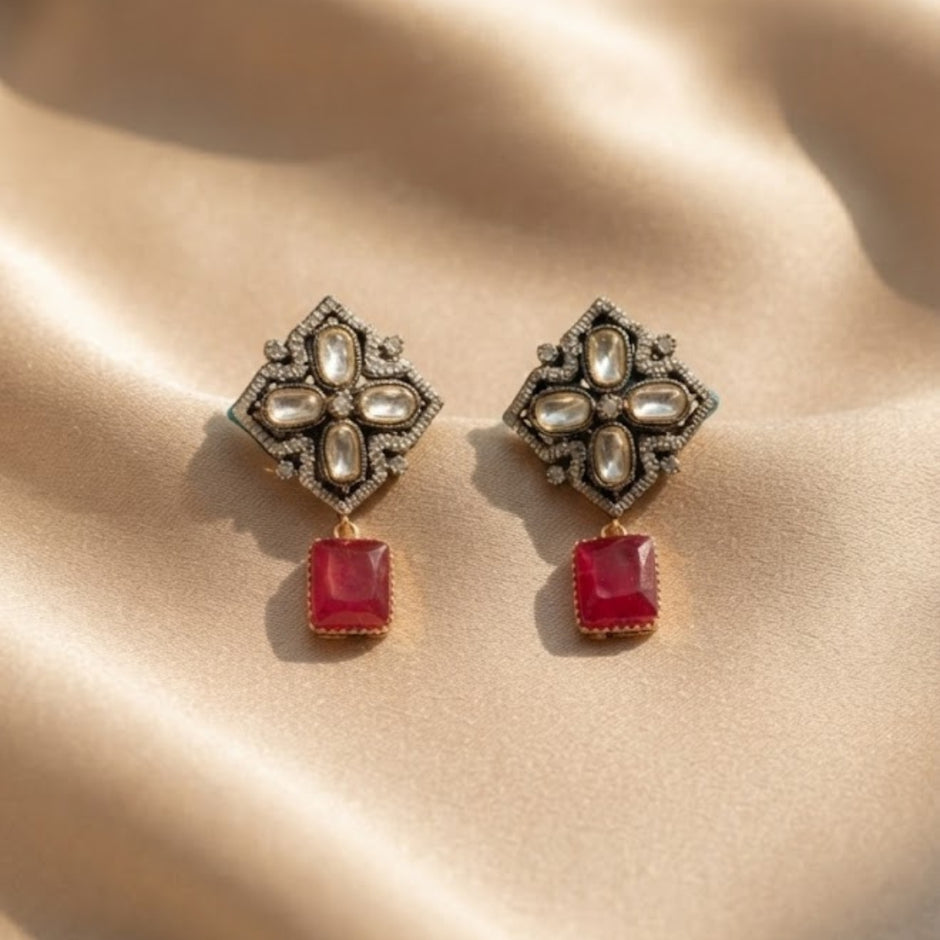 Bhavmayi Antique Gold Polki Kundan Necklace Set with Crimson Ruby Red Gemstone Drops and Matching Earrings