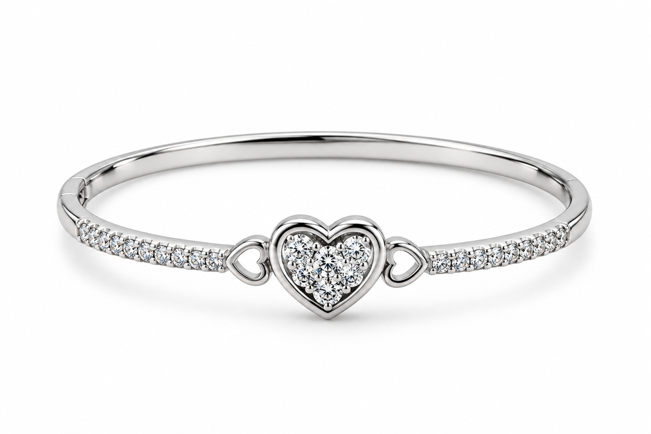 Silver-tone heart, Gold-tone statement ring, Gold-tone oval bangle bracelet detailed heart-shaped centrepiece and a repeating link-style band.