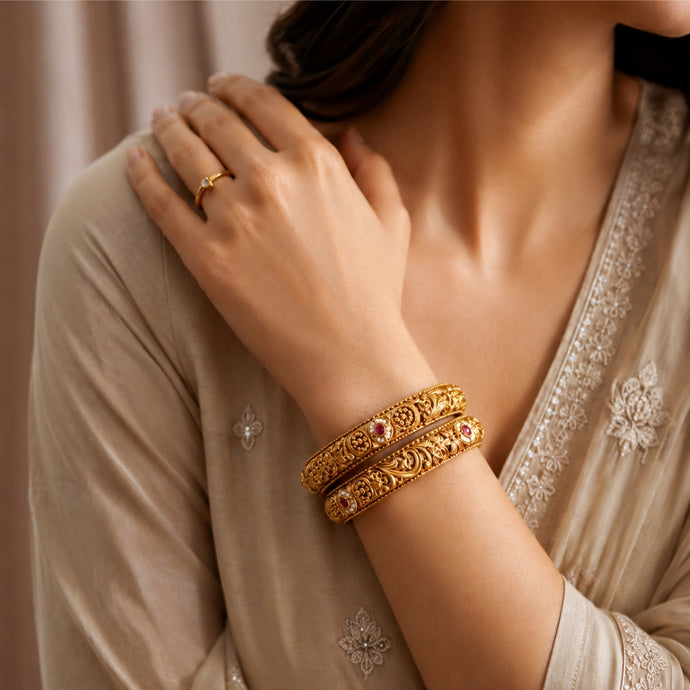 Bhavmayi Gold Plated Antique Temple Granulation Bangles Pair with Ruby Red Cabochons and Pearl Halos