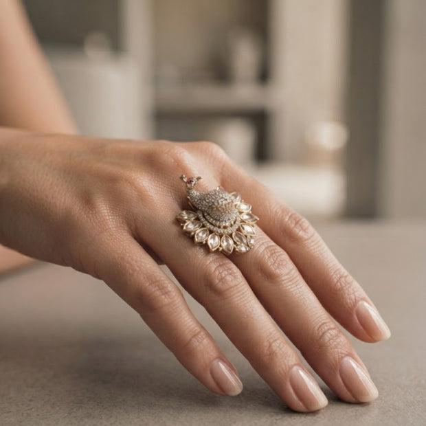 Bhavmayi Gold Plated Uncut Polki Kundan Feather Fan with 3D Pave Crystal Peacock Statement Ring