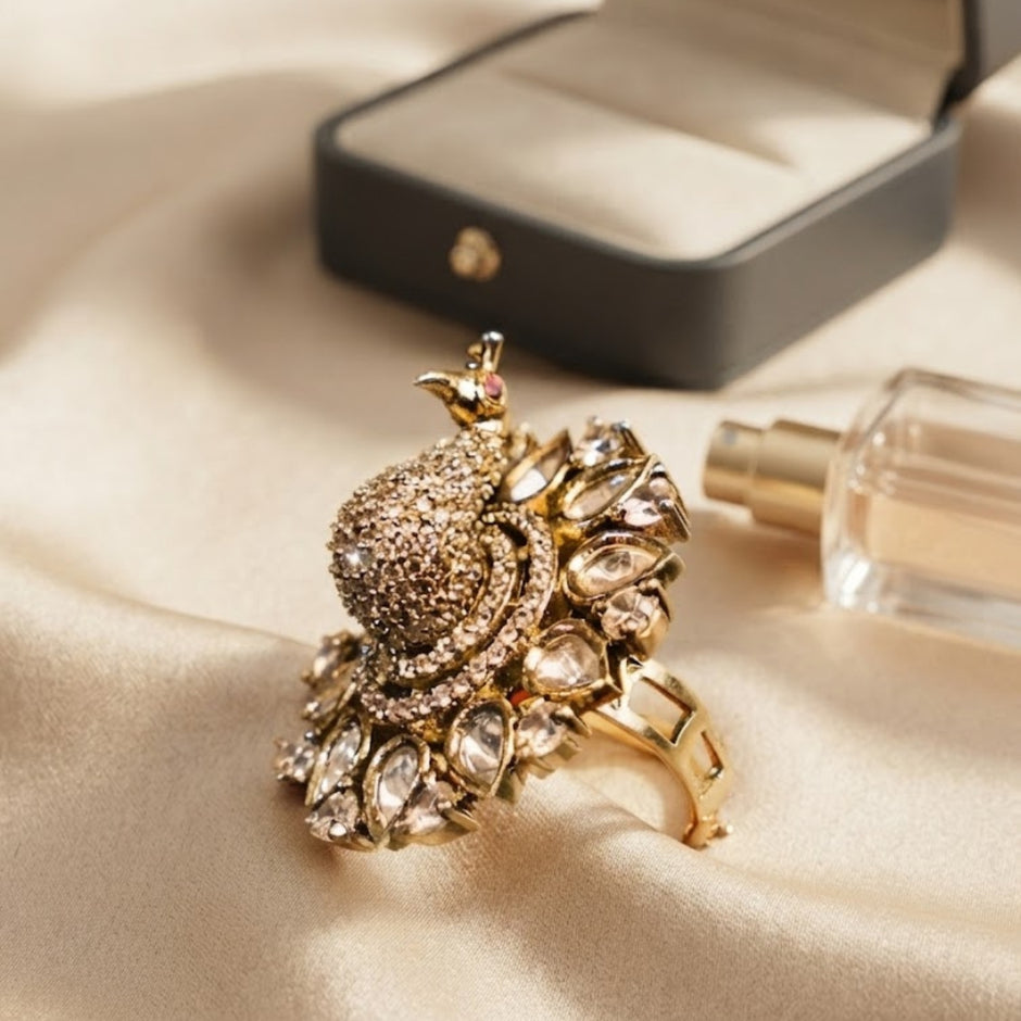 Bhavmayi Gold Plated Uncut Polki Kundan Feather Fan with 3D Pave Crystal Peacock Statement Ring