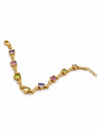 Gold-tone chain bracelet featuring geometric golden links and multicoloured blue, purple, pink, green and clear decorative accents, shown separately and worn on a wrist.