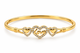 Silver-tone heart, Gold-tone statement ring, Gold-tone oval bangle bracelet detailed heart-shaped centrepiece and a repeating link-style band.
