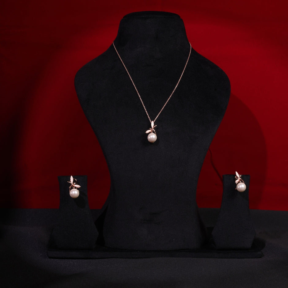 Bhavmayi Graceful Rose Gold Dragonfly & Lustrous Pearl Pendant Set with Earrings.