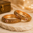 Bhavmayi Gold Plated Antique Temple Granulation Bangles Pair with Ruby Red Cabochons and Pearl Halos