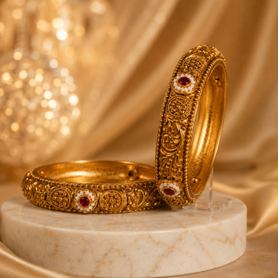 Bhavmayi Gold Plated Antique Temple Granulation Bangles Pair with Ruby Red Cabochons and Pearl Halos