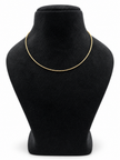 Delicate gold-tone chain necklace with closely linked textured detailing, displayed in multiple loops on a white background and worn around the neck on a black jewellery bust.