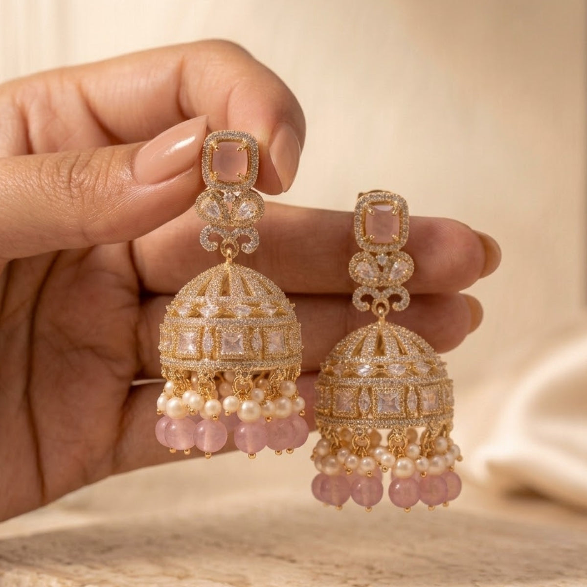 Bhavmayi Elegant Gold Pastel Pink and Diamond Jhumka Earrings with Pearl Fringe