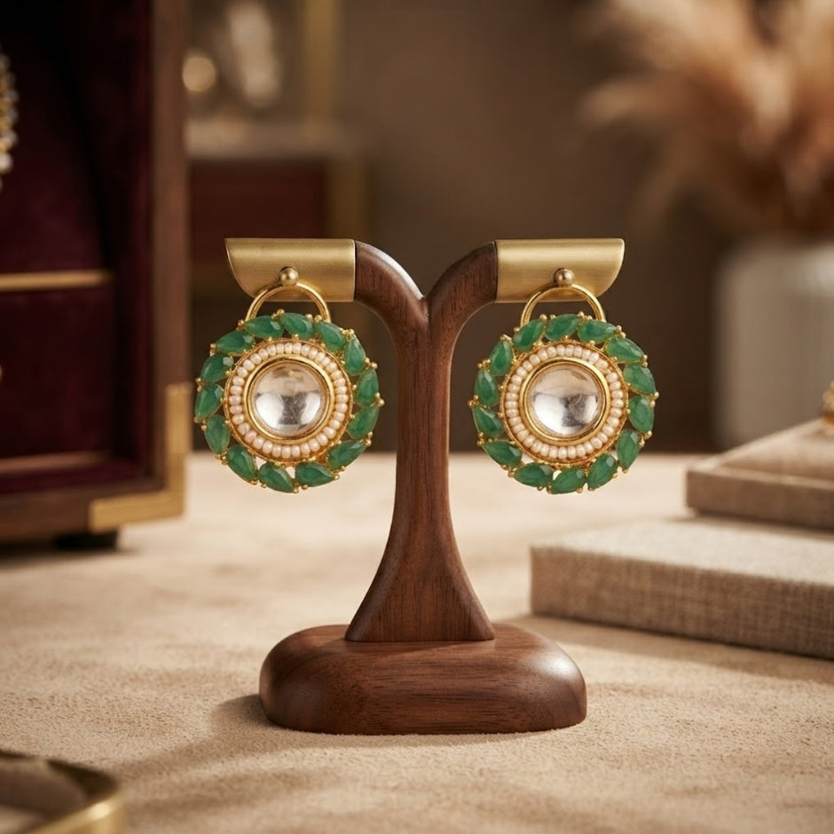 Bhavmayi Gold Plated Round Polki Kundan Stud Earrings with Pearl Halo and Pear Cut Emerald Green Gemstone Wreath