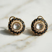 Bhavmayi Gold Plated Round Polki Kundan Stud Earrings with Pearl Halo and Pear Cut Emerald Green Gemstone Wreath