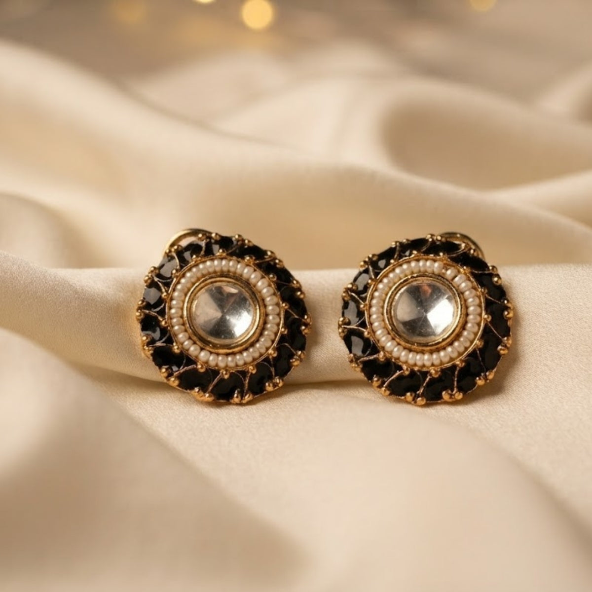 Bhavmayi Gold Plated Round Polki Kundan Stud Earrings with Pearl Halo and Pear Cut Emerald Green Gemstone Wreath