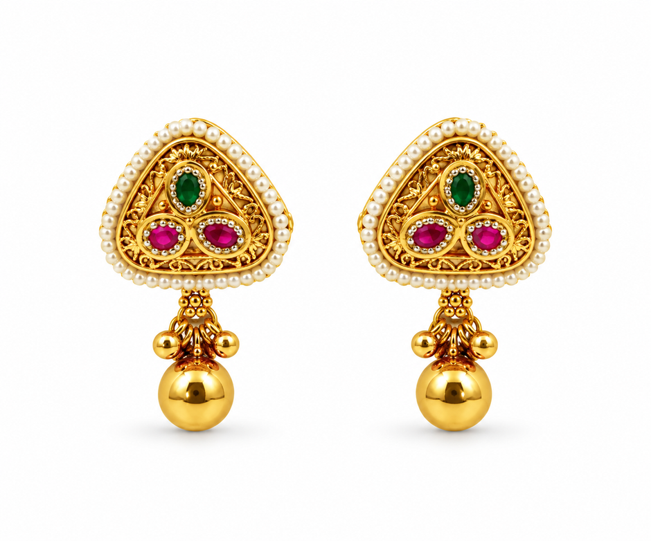 Gold-tone temple necklace set displayed on a white jewellery bust, featuring a decorative pendant with green and magenta accents, a beaded chain, and matching triangular drop earrings.