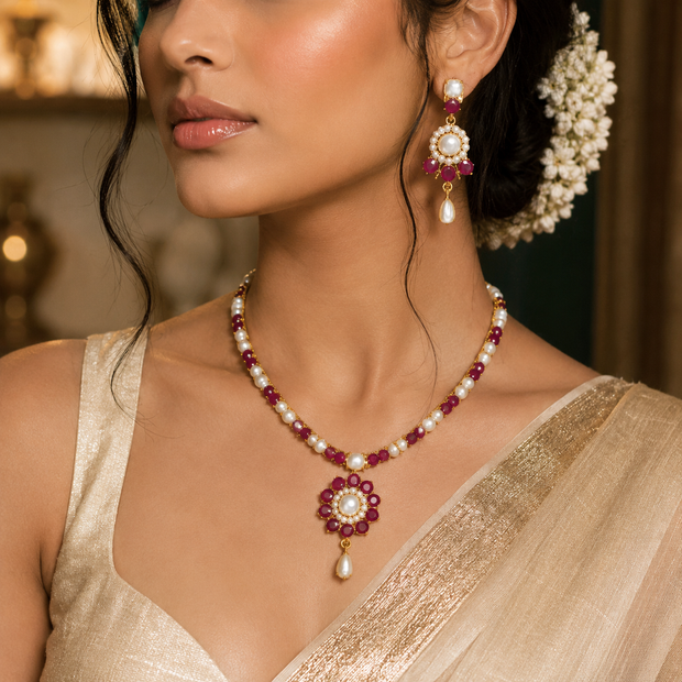 Bhavmayi Classic Ruby-Red Stone & Lustrous Round and Teardrop Pearls Flower Accent Pendant Heritage Necklace Set with Earrings