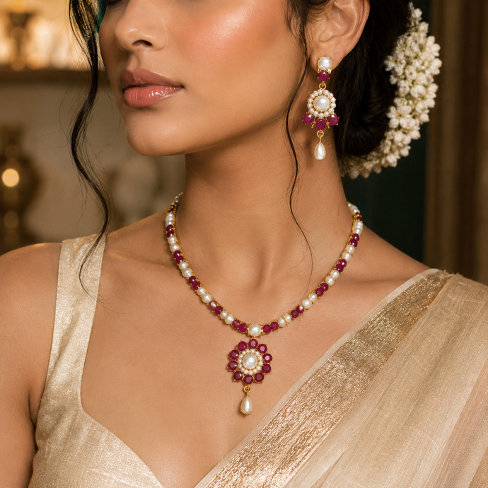 Bhavmayi Classic Ruby-Red Stone & Lustrous Round and Teardrop Pearls Flower Accent Pendant Heritage Necklace Set with Earrings