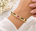 Bhavmayi Pink Gemstone Multi-Rail Gold-Tone Designer Bangle