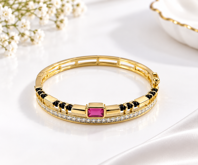 Bhavmayi Pink Gemstone Multi-Rail Gold-Tone Designer Bangle