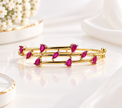 Bhavmayi Ruby Marquise Stone Multi-Rail Gold-Tone Bangle