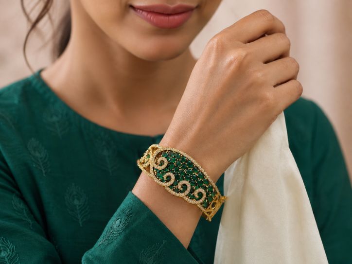 Bhavmayi Emerald Green Stone Gold-Tone Designer Statement Bangle for Women