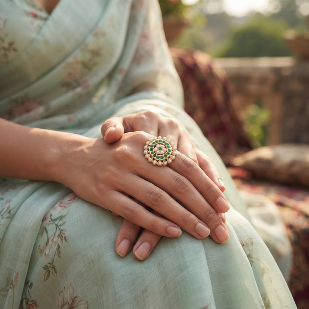 Bhavmayi Gold Plated Traditional Circullar Pearl & Emerald Green Gemstone Statement Jadau Ring