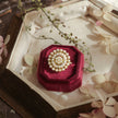 Bhavmayi Gold Plated Traditional Circullar Pearl & Emerald Green Gemstone Statement Jadau Ring