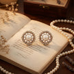 Bhavmayi Rose Gold Freshwater Pearl Stud Earrings with Baguette Cut Crystal Sunburst Halo