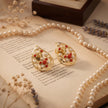 Bhavmayi Elegant 14K Gold Filigree Handmade Teardrop Studs with Coral & Pearl Accents