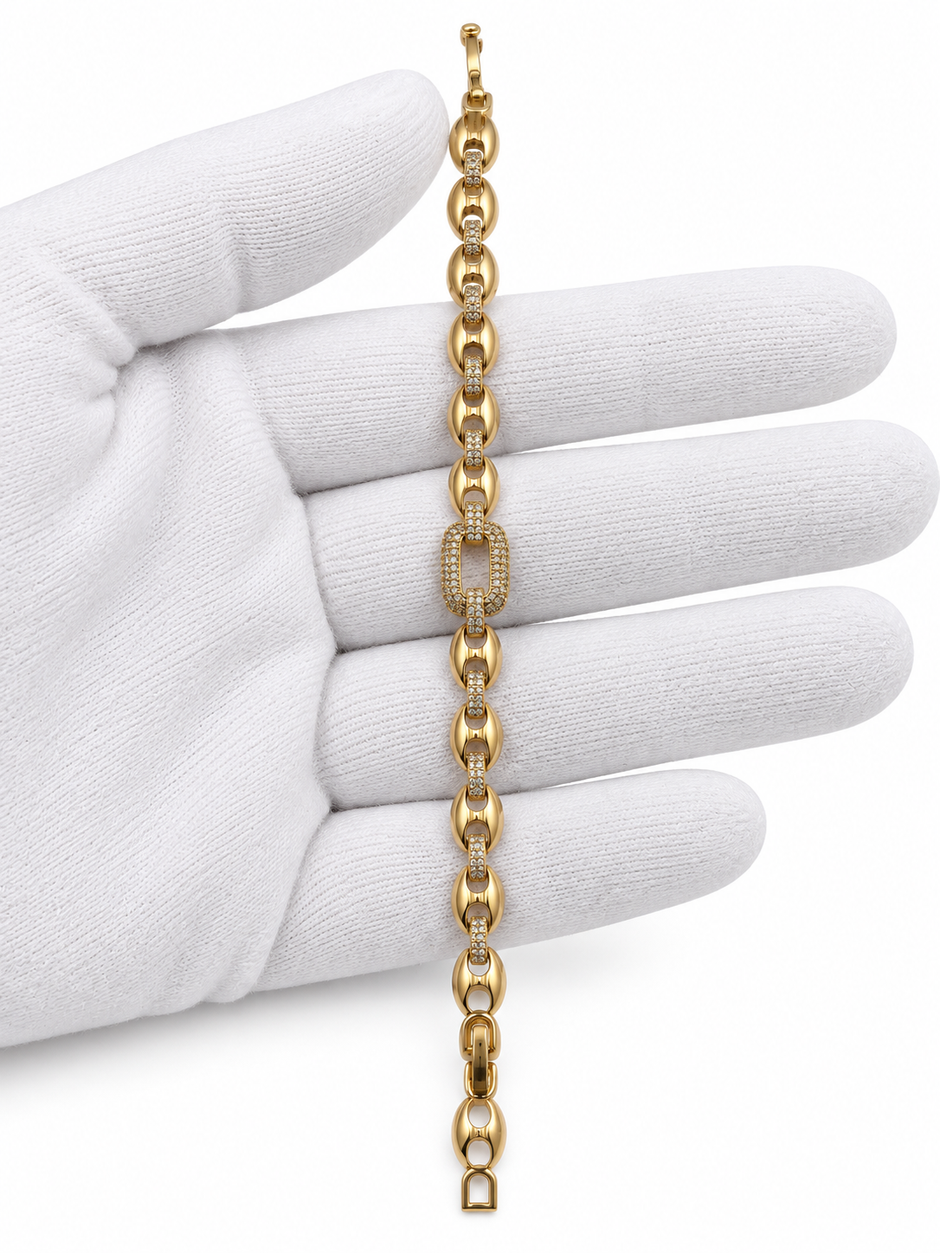 Gold-tone link bracelet with three rectangular purple, pink and green stones in square clear-stone settings, shown from the front and reverse.