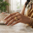 Bhavmayi Gold-Plated Multi-Layer Crystal Bow Ring