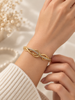 Silver-tone heart, Gold-tone statement ring, Gold-tone oval bangle bracelet detailed heart-shaped centrepiece and a repeating link-style band.