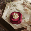 Bhavmayi Gold Plated Traditional Circullar Pearl & Emerald Green Gemstone Statement Jadau Ring - bhavmayi