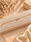 Bhavmayi gold-tone bracelet with a spiral motif covered in clear reflective accents and a delicate chain - bhavmayi