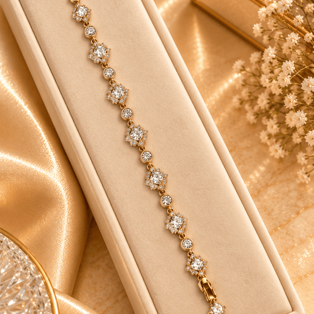 Golden link bracelet with alternating square and round clear sparkling accents in a delicate geometric design