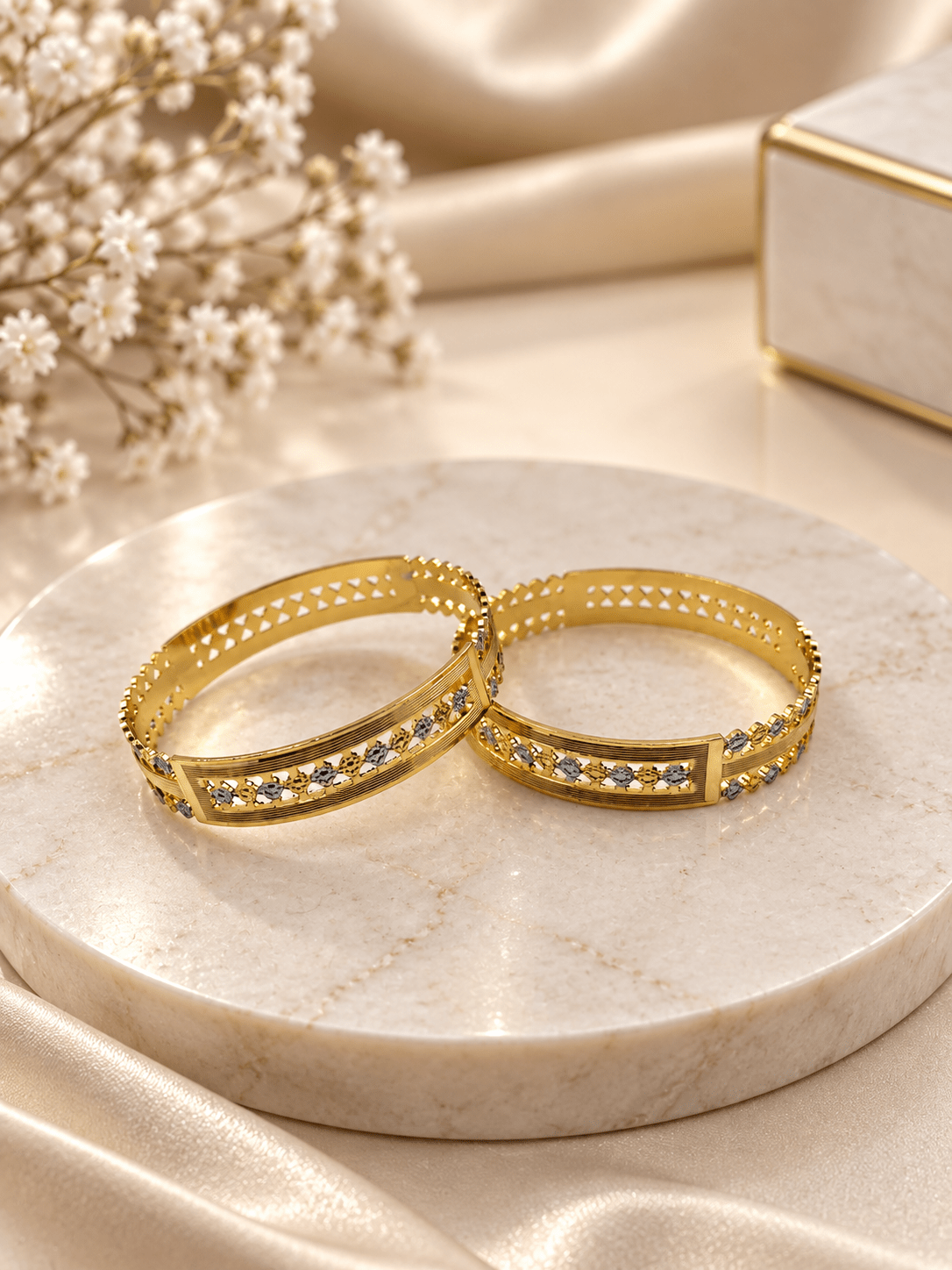 Bhavmayi gold-tone kada bangle set with repeating clear accents and intricate decorative detailing - bhavmayi
