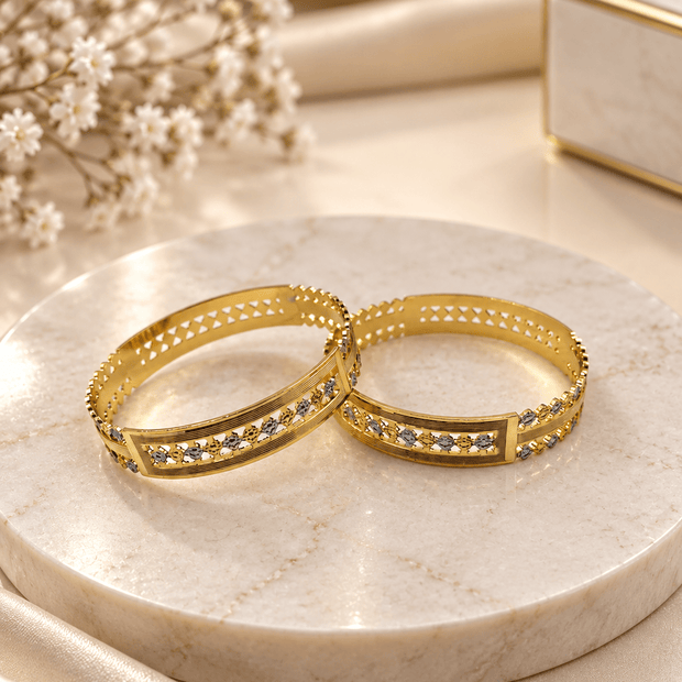 Bhavmayi gold-tone kada bangle set with repeating clear accents and intricate decorative detailing - bhavmayi