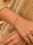 Bhavmayi gold-tone link bracelet with textured rounded centre bead, detailed chain links and extension chain - bhavmayi