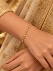 Bhavmayi gold-tone marquise link bracelet with clear reflective accents and geometric connector details - bhavmayi