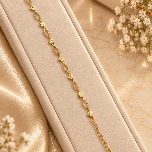 Bhavmayi gold-tone marquise link bracelet with clear reflective accents and geometric connector details - bhavmayi