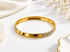 Bhavmayi gold-tone men's kada with silver-tone geometric detailing - bhavmayi