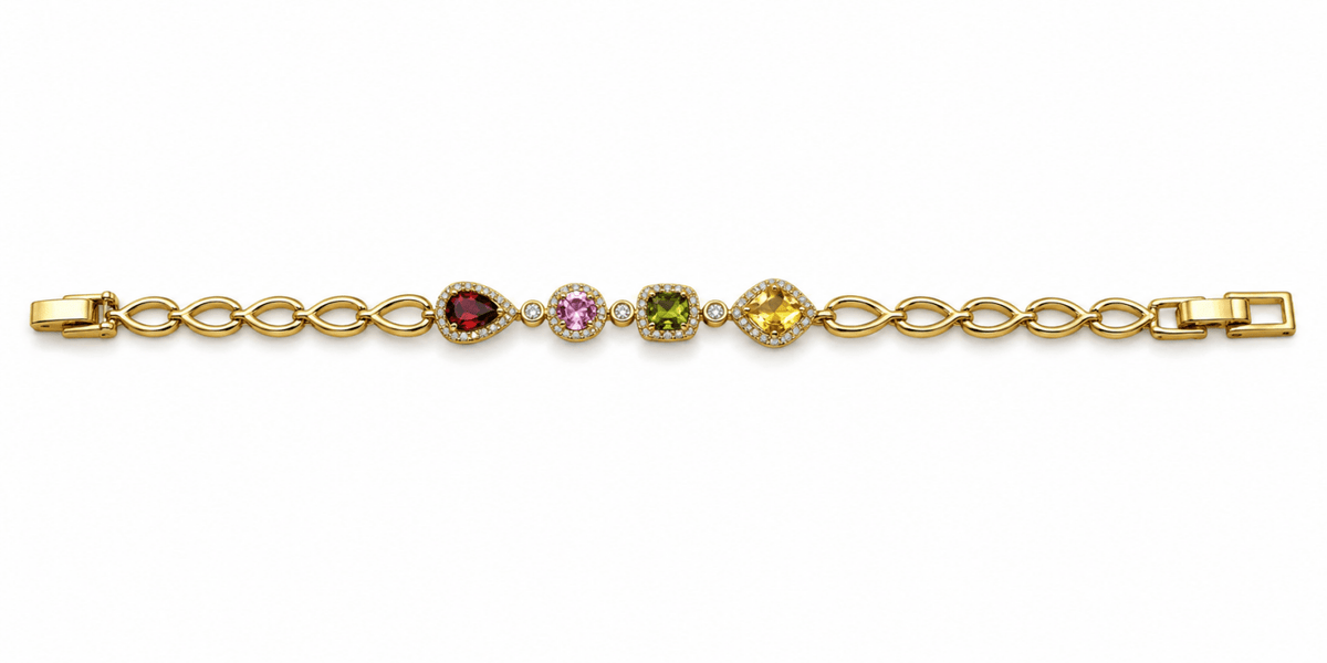 Golden oval link bracelet with deep red pink and amber-brown coloured accents and clear decorative borders
