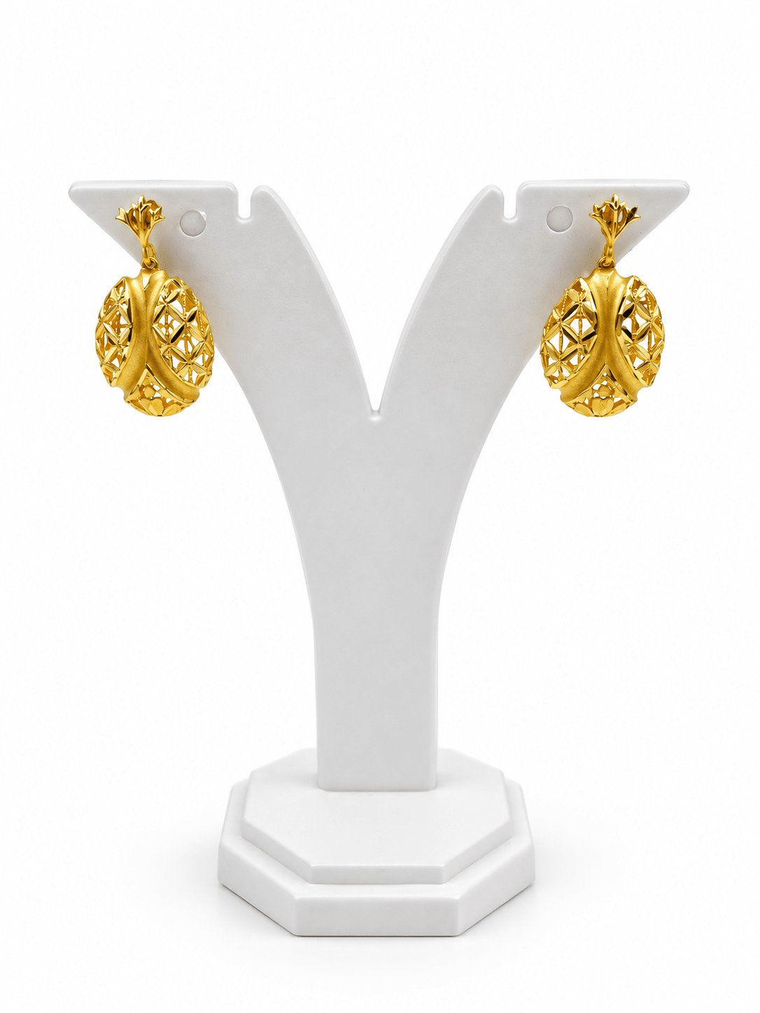Bhavmayi gold-tone necklace and matching earrings featuring elongated leaf motifs with intricate open lattice detailing - bhavmayi