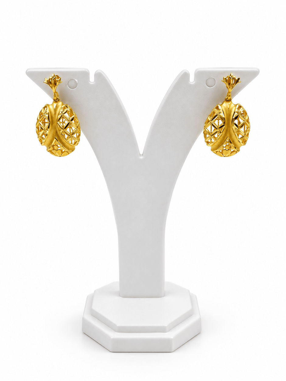 Bhavmayi gold-tone necklace and matching earrings featuring elongated leaf motifs with intricate open lattice detailing - bhavmayi