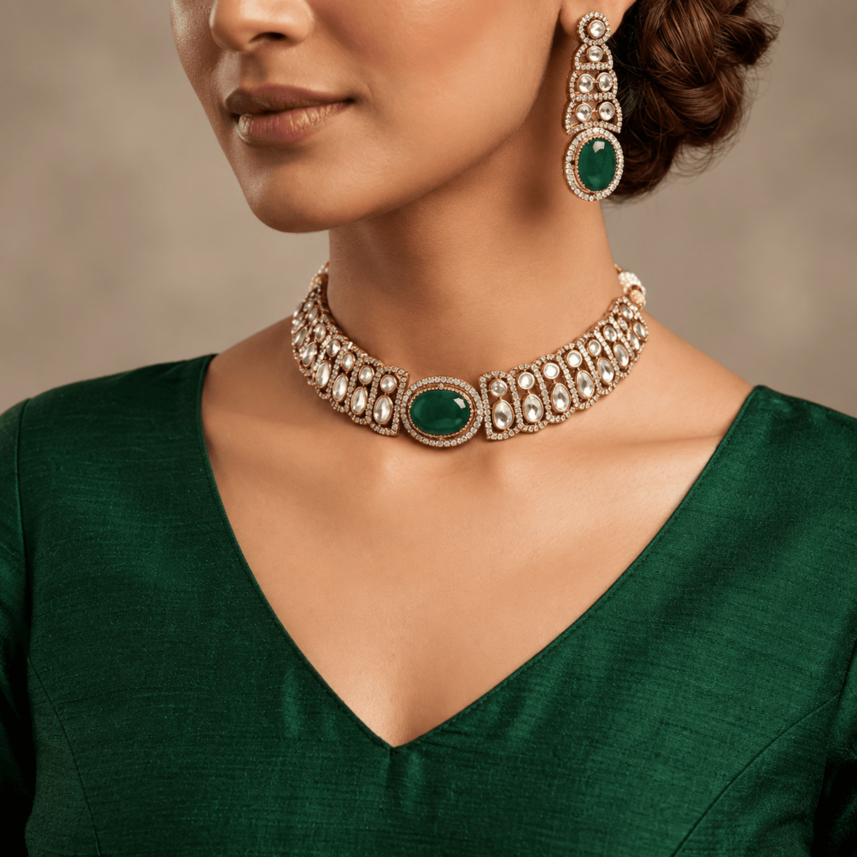 Bhavmayi gold-tone necklace set with green oval stones, white decorative accents and matching drop earrings - bhavmayi